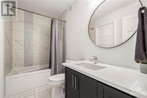 The main bathroom, offers direct access to one bedroom as ensuite as well as offering access to other second floor bedrooms. A great design option. All bathrooms in this home offer the same attent - 708 Geneva Crescent, Embrun, ON - Indoor Photo Showing Bathroom