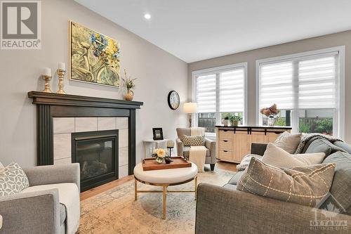 401 Warmstone Drive, Stittsville, ON - Indoor Photo Showing Living Room With Fireplace