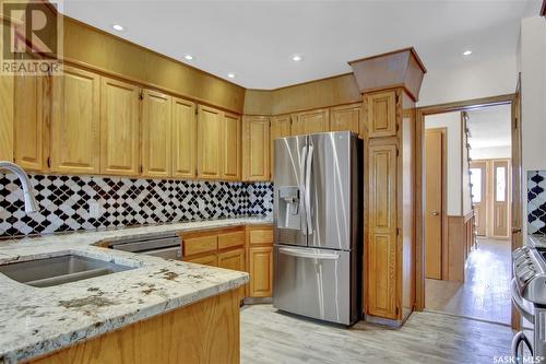 3722 Bryden Bay, Regina, SK - Indoor Photo Showing Kitchen With Double Sink