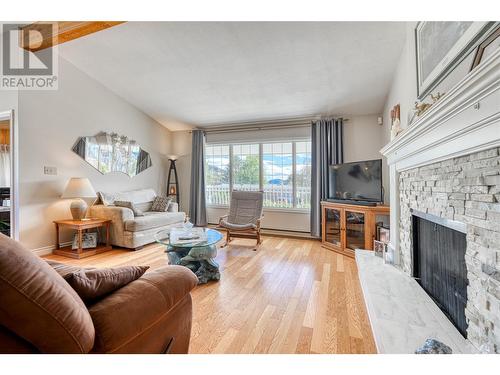 125 Corry Place, Penticton, BC - Indoor Photo Showing Living Room With Fireplace