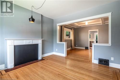 46 Rosslyn Avenue N, Hamilton, ON - Indoor Photo Showing Other Room With Fireplace