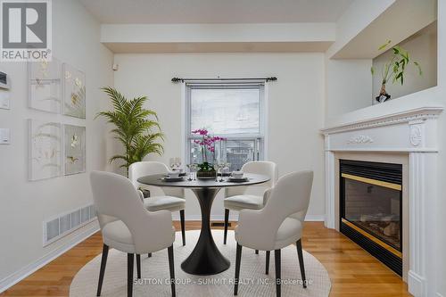 64 Knightswood Crescent, Brampton, ON - Indoor Photo Showing Dining Room With Fireplace