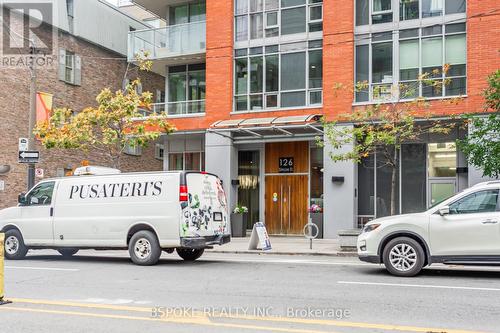 2104 - 126 Simcoe Street, Toronto, ON - Outdoor With Balcony With Facade