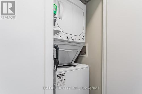 2104 - 126 Simcoe Street, Toronto, ON - Indoor Photo Showing Laundry Room