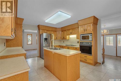 443 Whiteswan Drive, Saskatoon, SK - Indoor Photo Showing Kitchen With Stainless Steel Kitchen With Double Sink