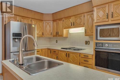 443 Whiteswan Drive, Saskatoon, SK - Indoor Photo Showing Kitchen With Double Sink