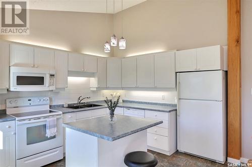 3416 12Th Avenue E, Prince Albert, SK - Indoor Photo Showing Kitchen With Double Sink