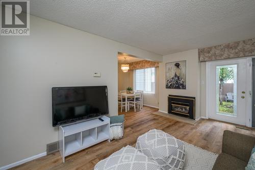 185 111 Tabor Boulevard, Prince George, BC - Indoor Photo Showing Living Room With Fireplace