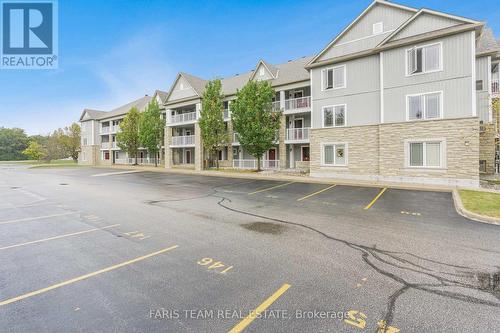 102 - 40 Mulligan Lane, Wasaga Beach, ON - Outdoor With Facade