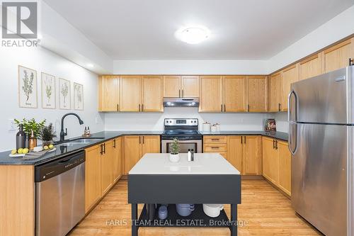 102 - 40 Mulligan Lane, Wasaga Beach, ON - Indoor Photo Showing Kitchen With Double Sink