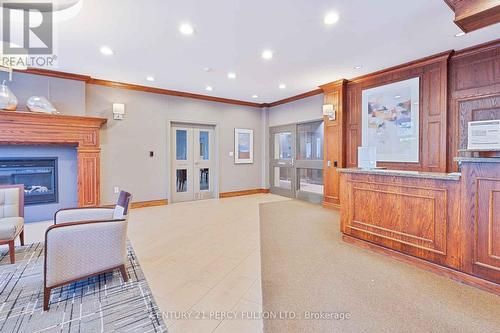 501 - 19 Barberry Place, Toronto, ON - Indoor Photo Showing Other Room With Fireplace