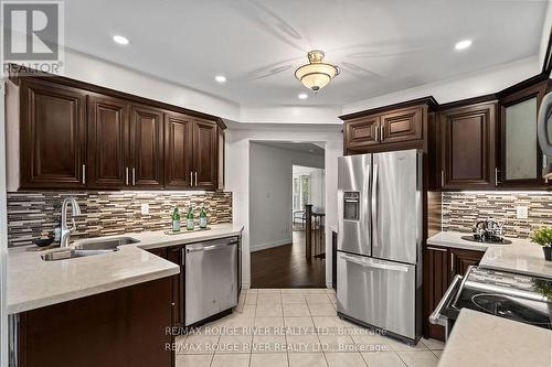 31 Kerrison Drive W, Ajax (Central), ON - Indoor Photo Showing Kitchen With Double Sink With Upgraded Kitchen