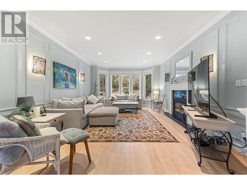 9732 Cameron Road, Vernon, BC - Indoor Photo Showing Living Room With Fireplace