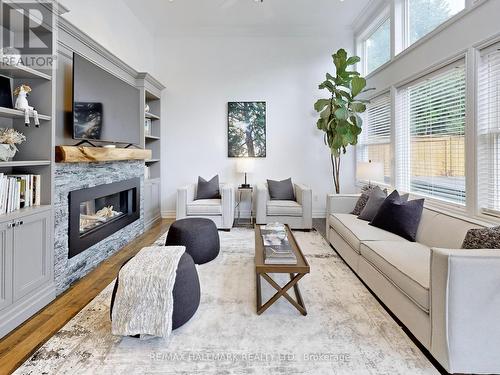 15 Lyme Regis Crescent, Toronto, ON - Indoor Photo Showing Living Room With Fireplace