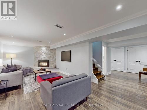 15 Lyme Regis Crescent, Toronto, ON - Indoor Photo Showing Living Room With Fireplace