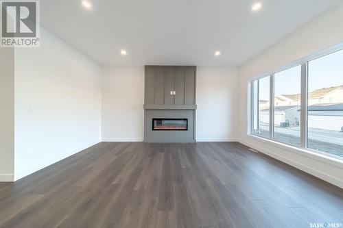 202 Doran Way, Saskatoon, SK - Indoor Photo Showing Other Room With Fireplace