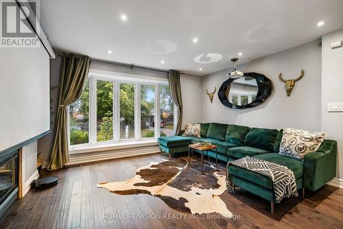 35 Brown Street, New Tecumseth, ON - Indoor Photo Showing Living Room With Fireplace