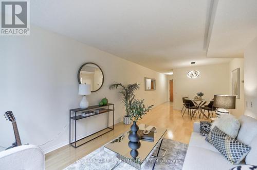 202 - 35 Finch Avenue E, Toronto, ON - Indoor Photo Showing Living Room