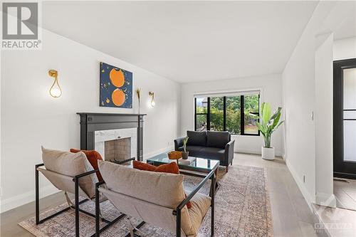 73 Lillico Drive, Ottawa, ON - Indoor Photo Showing Living Room With Fireplace