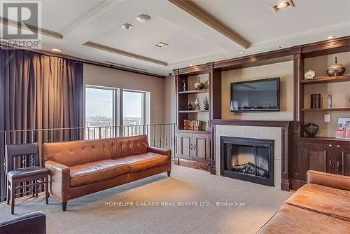 901 - 388 Prince Of Wales Drive, Mississauga, ON - Indoor Photo Showing Living Room With Fireplace