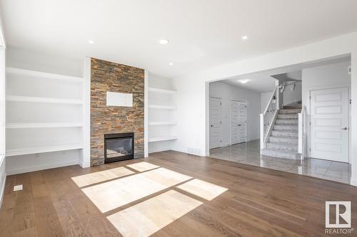 21351 96 Av Nw, Edmonton, AB - Indoor Photo Showing Living Room With Fireplace