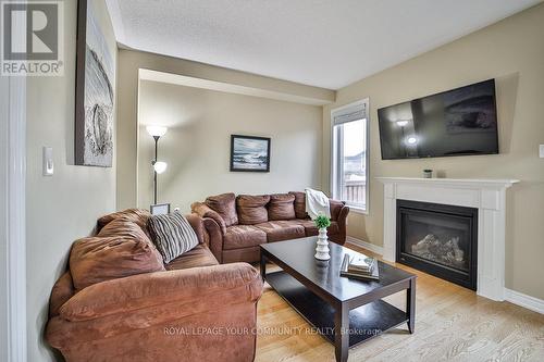 115 Mcgahey Street, New Tecumseth, ON - Indoor Photo Showing Living Room With Fireplace