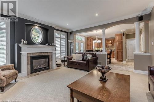 Overlooks backyard - 641 Greenwood Drive Unit# 1, Burlington, ON - Indoor Photo Showing Living Room With Fireplace