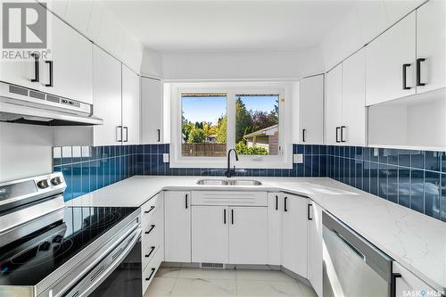 3623 25Th Avenue, Regina, SK - Indoor Photo Showing Kitchen With Double Sink