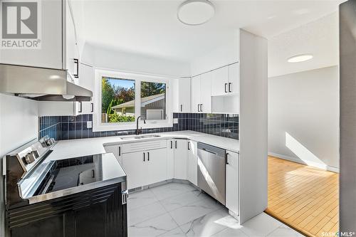 3623 25Th Avenue, Regina, SK - Indoor Photo Showing Kitchen With Double Sink