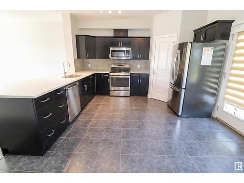 #28 5873 Mullen Pl Nw, Edmonton, AB - Indoor Photo Showing Kitchen