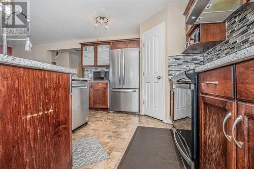 57 Saddlecrest Park Ne, Calgary, AB - Indoor Photo Showing Kitchen