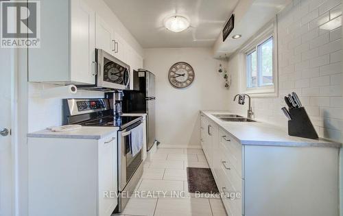 55 - 25 Linfield Drive, St. Catharines, ON - Indoor Photo Showing Kitchen With Double Sink