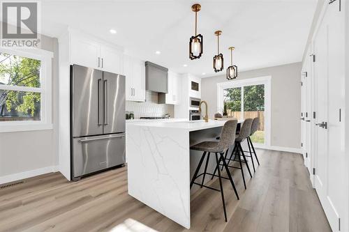 7708 Silver Springs Road Nw, Calgary, AB - Indoor Photo Showing Kitchen With Upgraded Kitchen