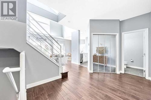 Front closet and half bath - 1203, 1514 11 Street Sw, Calgary, AB - Indoor Photo Showing Other Room