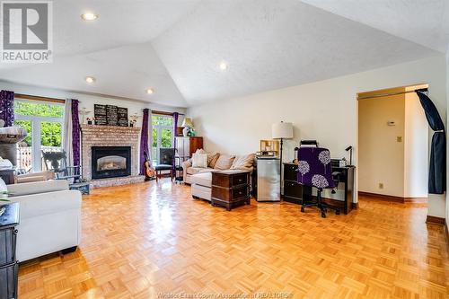 302 Applewood, Kingsville, ON - Indoor Photo Showing Living Room With Fireplace