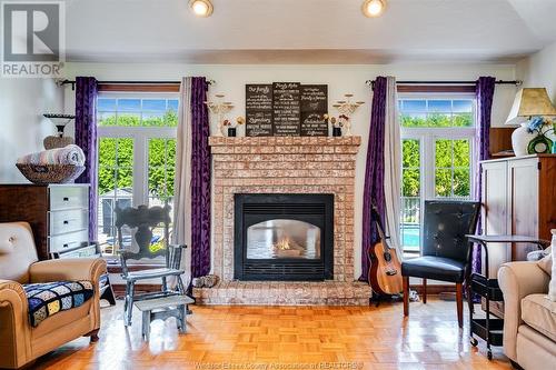 302 Applewood, Kingsville, ON - Indoor Photo Showing Living Room With Fireplace