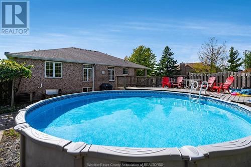 302 Applewood, Kingsville, ON - Outdoor With Above Ground Pool With Backyard