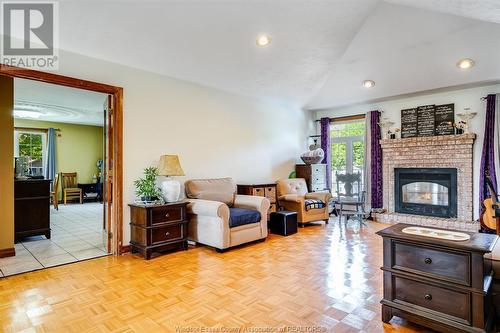 302 Applewood, Kingsville, ON - Indoor Photo Showing Living Room With Fireplace