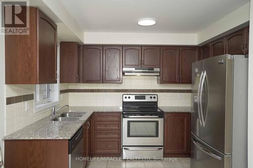 69 Teal Crest Circle, Brampton, ON - Indoor Photo Showing Kitchen With Double Sink