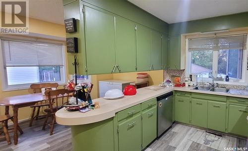 214 Centre Avenue, Meadow Lake, SK - Indoor Photo Showing Kitchen With Double Sink