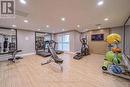 325 - 128 Grovewood Common, Oakville, ON  - Indoor Photo Showing Gym Room 