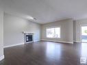 2226 Ware Co Nw, Edmonton, AB  - Indoor Photo Showing Living Room With Fireplace 