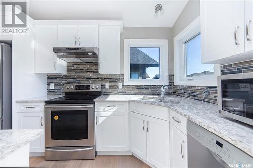 1107 Evergreen Boulevard, Saskatoon, SK - Indoor Photo Showing Kitchen With Upgraded Kitchen