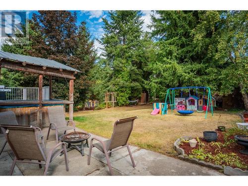 110 Cedar  Avenue, Fruitvale, BC - Outdoor With Deck Patio Veranda With Backyard