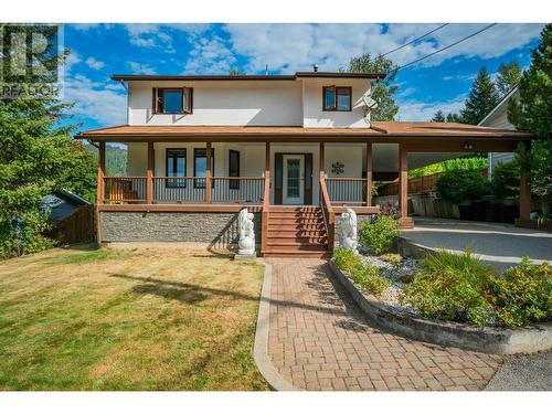 110 Cedar  Avenue, Fruitvale, BC - Outdoor With Deck Patio Veranda With Facade