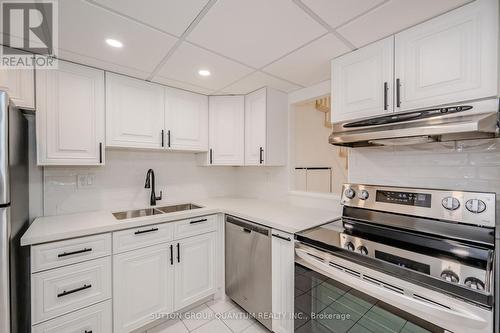 408 - 100 Bronte Road, Oakville, ON - Indoor Photo Showing Kitchen With Double Sink