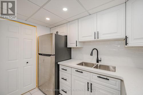 408 - 100 Bronte Road, Oakville, ON - Indoor Photo Showing Kitchen With Double Sink