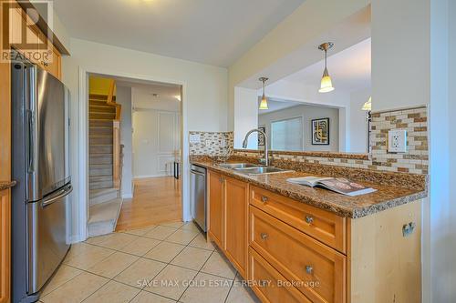 34 Finney Terrace N, Milton, ON - Indoor Photo Showing Kitchen With Double Sink