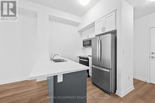 513 - 470 Dundas Street E, Hamilton, ON - Indoor Photo Showing Kitchen With Double Sink