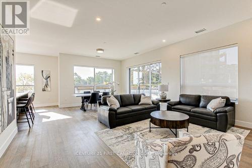 202 - 1696 Fiddlehead Place, London, ON - Indoor Photo Showing Living Room